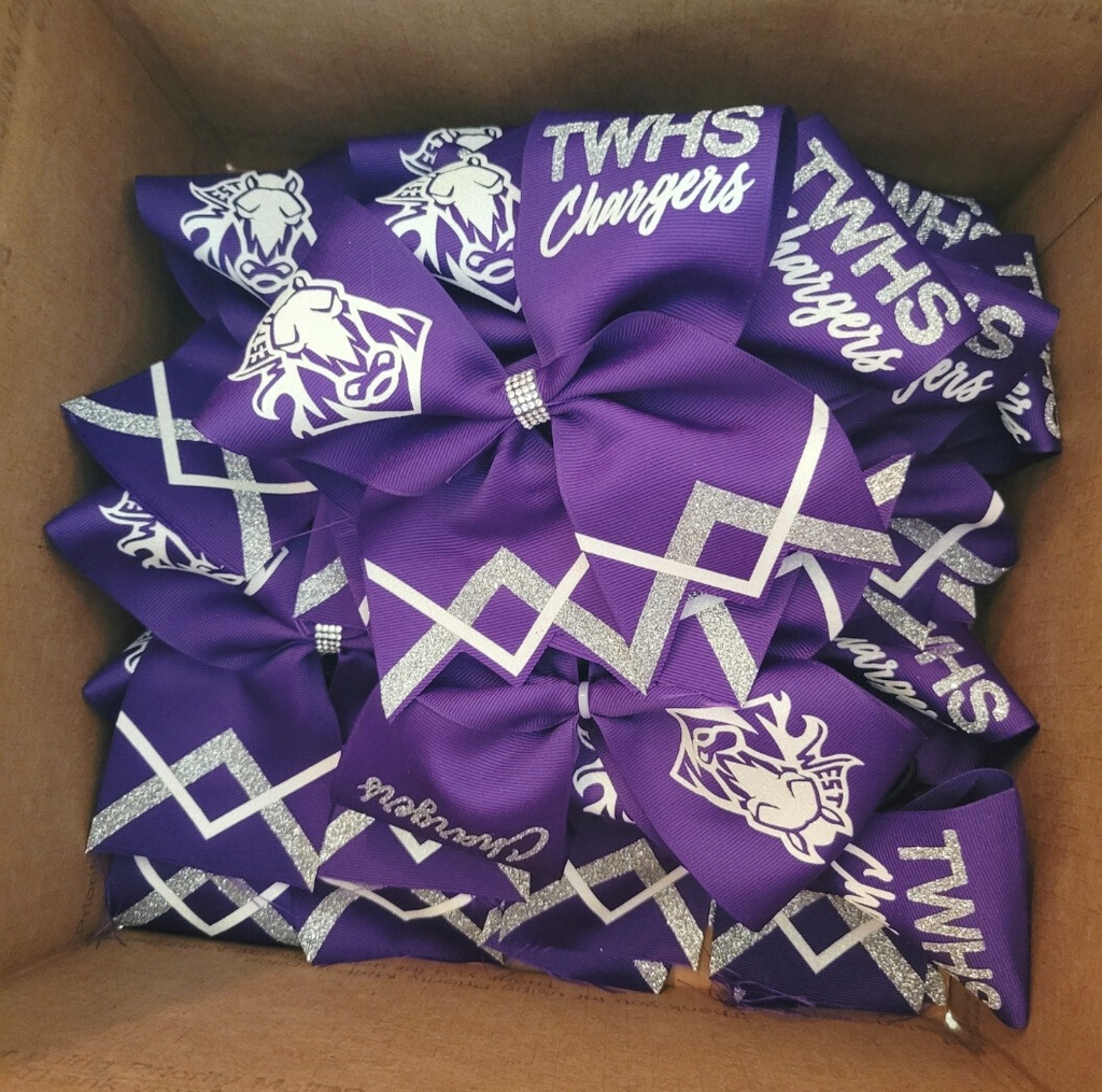 Team bows with glitter.